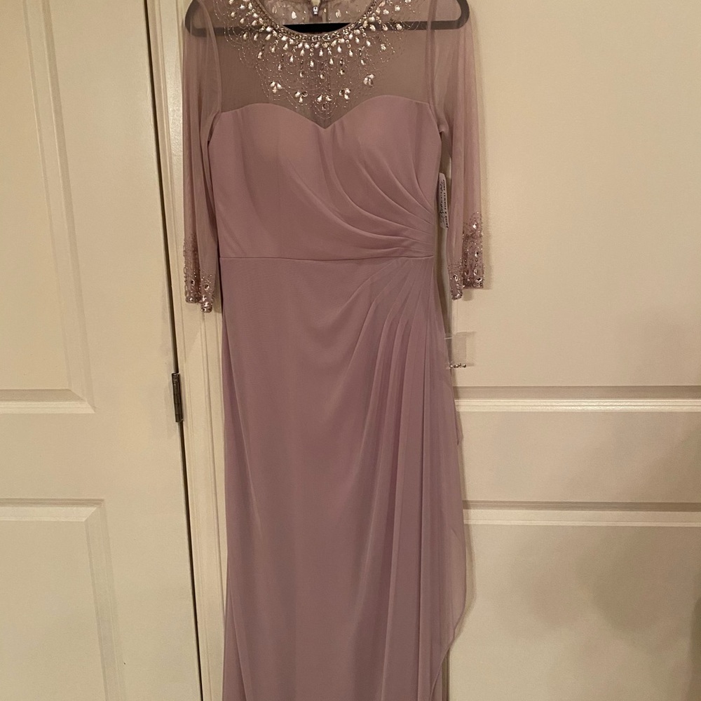 Stunning gown with beading at collar and sleeves